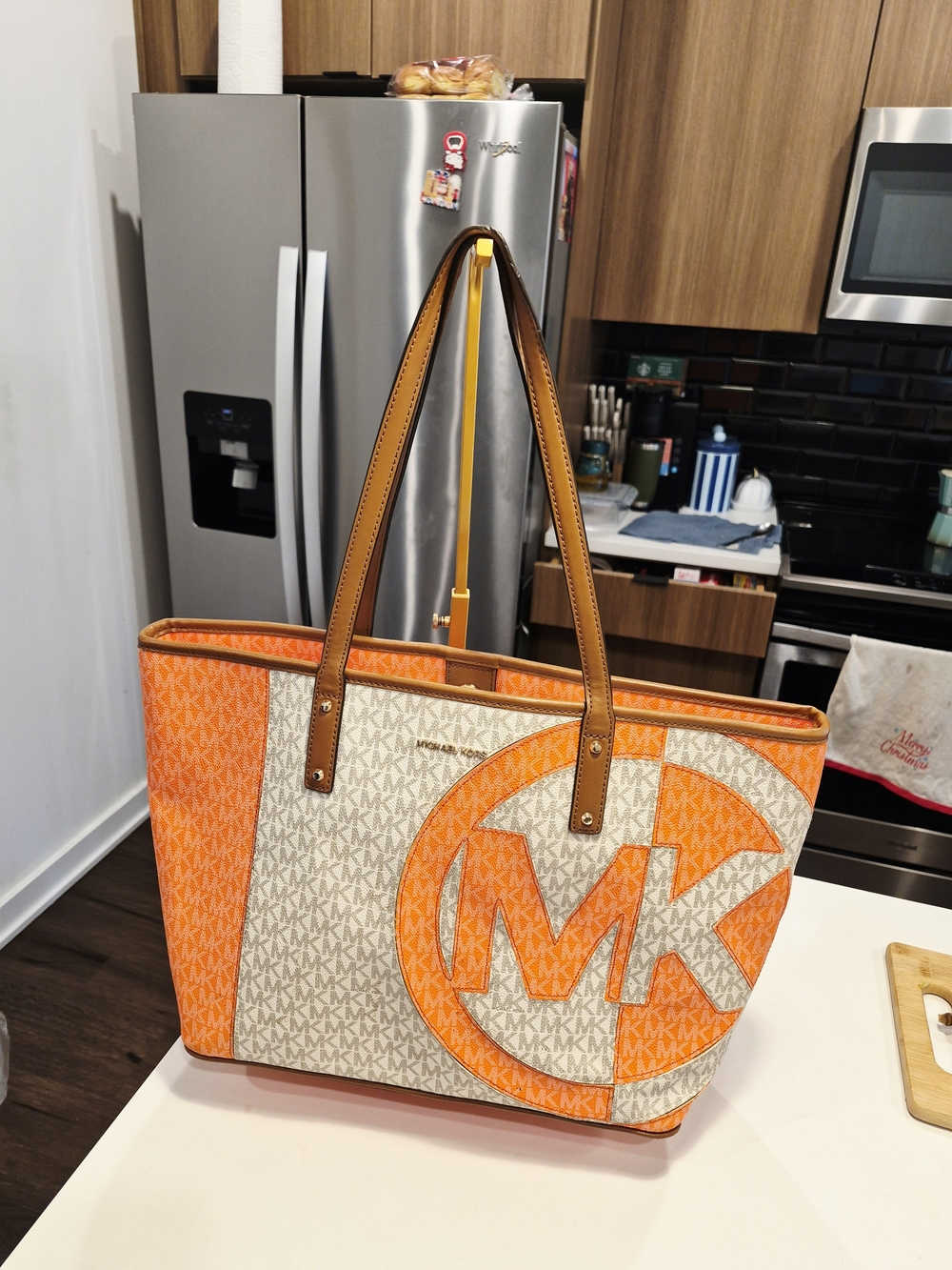 Michael Kors Carter Large Logo Two-Tone Tote Bag in a vibrant orange and tan NWT